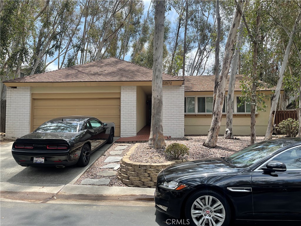 ilocated in Lake Forest’s Woods community. This beautiful single-story home has been totally upgraded with a detached guest house. The guest house has a separate entry and separate address. The guest house will be rented out, or the main house tenant can rent it. The kitchen has been upgraded and opens to a comfortable family room, and the backyard offers a pristine area for outdoor dining. The master suite includes high ceilings, a walk-in closet, and a stylish bathroom with a walk-in shower. Both additional bedrooms are generously sized and offer plenty of closet space. Living in The Woods comes with access to the Lake Forest Beach & Tennis Club, where you can enjoy swimming pools, tennis courts, a fitness center, volleyball, basketball, BBQ areas, and a man-made lake with a beach lagoon. This peaceful community is surrounded by tree-lined streets and walking trails.