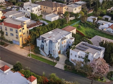 Photo of 4916 W 12th ST, Los Angeles, CA 90019 (MLS # SR26185421)