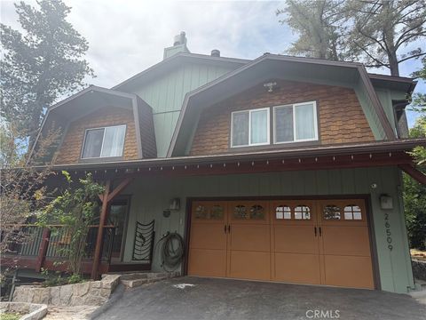 Photo of 26509 Lake Forest Drive, Twin Peaks, CA 92391 (MLS # IG26109740)
