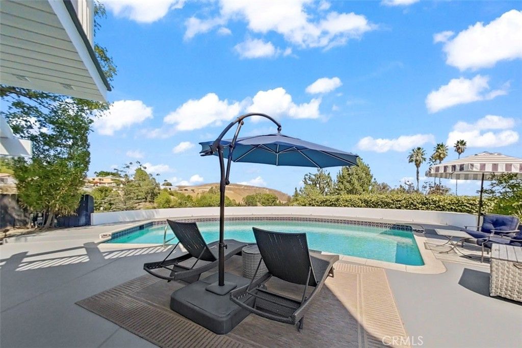 Photo of 20267 Delita Drive, Woodland Hills, CA 91364 (MLS # SR25217413)