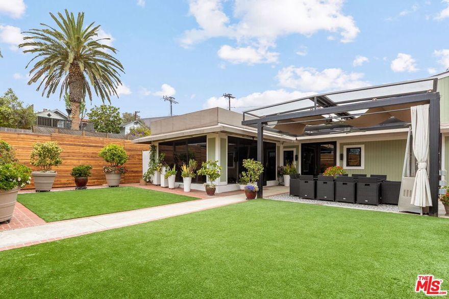 Tucked away in the heart of Ocean Park, this stylish Westside home offers the perfect blend of comfort, function, and coastal living. Sunlight fills the open spaces, highlighting the natural textures of travertine and hardwood floors. The flexible 2-bedroom, 2-bath layout includes a dedicated office with custom built-ins, ideal for remote work or study. The second bedroom can also serve as a home gym, yoga space, or creative studio, offering versatility for modern lifestyles. The kitchen features stone counters, stainless appliances, and generous storage, opening to warm, comfortable living areas that flow naturally to the outdoors. A private yard with mature landscaping and a covered patio provides a relaxed setting for morning coffee or casual gatherings. Three covered parking spaces with storage add convenience, and the location is unbeatable, just moments from the beach, Main Street, Rose Avenue, and Abbot Kinney with easy access to the best dining, shopping, and local culture the Westside has to offer.