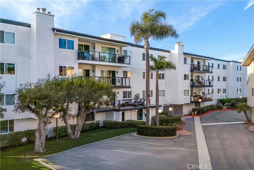 Experience resort-style living in this spacious 1,848 sq. ft. single-level Huntington Harbour end-unit condominium. Located on the first floor and offering one of the largest floor plans in the prestigious, guard-gated Bayport community, this home sits just across the street from the Pacific Ocean and sandy beaches, with the marina only moments away. A secured entry leads you into the building lobby and elevator, which brings you directly to the double-door entrance of this exclusive residence.

This home features 3 bedrooms and 4 turnkey bathrooms with upgraded fixtures and a freshly painted interior. Inside, you'll enjoy abundant natural light from upgraded double-pane windows, newer laminate flooring, and a brand-new HVAC system enhanced with a smart control thermostat. A wide formal foyer introduces the elegant living room with a gas fireplace, an adjoining dining area, and two sets of sliding doors that open to a generous balcony—perfect for taking in ocean breezes and peek-a-boo harbor views while enjoying your morning coffee or a relaxing sunset.

The spacious kitchen includes tiled countertops, brand-new vinyl flooring, and essential appliances to complete the space. Just off the kitchen is a separate full-size laundry room with ample linen cabinetry. Two bedrooms function as primary suites with walk-in closets, including an expansive main suite offering two separate bathrooms—one with a jetted soaking tub and the other with an oversized walk-in shower and upgraded vanity.

Bayport provides exceptional community amenities including a pool, spa, clubhouse, sports court, and pickleball court, all set against the beautiful backdrop of the bay and marina. The home also features two side-by-side parking spaces in the gated garage with storage cabinets, along with abundant guest parking.

Blending luxury, convenience, and coastal charm, this exceptional residence is just a short stroll from Sunset Beach, Peter’s Landing, Starbucks, Mother’s Market, and a variety of popular dining options. Don’t miss your chance to enjoy the finest of Huntington Harbour living!