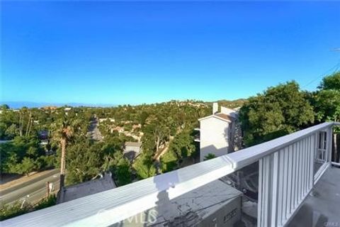 Photo of 21651 Yucatan Avenue, Woodland Hills, CA 91364 (MLS # GD25069129) Photo of 21651 Yucatan Avenue, Woodland Hills, CA 91364 (MLS # GD25069129)