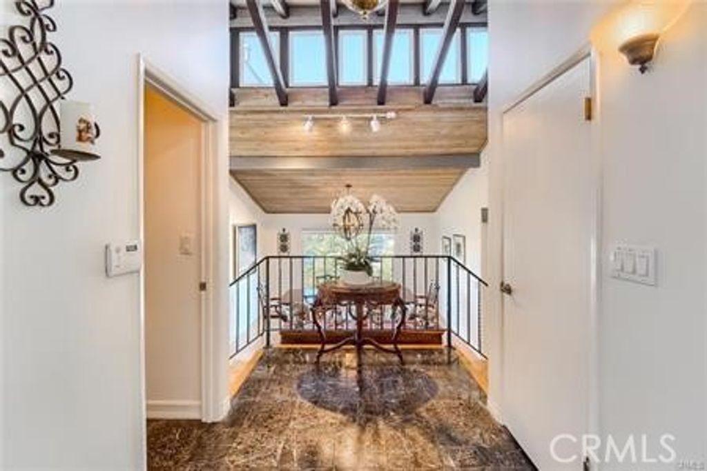 Photo of 21651 Yucatan Avenue, Woodland Hills, CA 91364 (MLS # GD25069129)