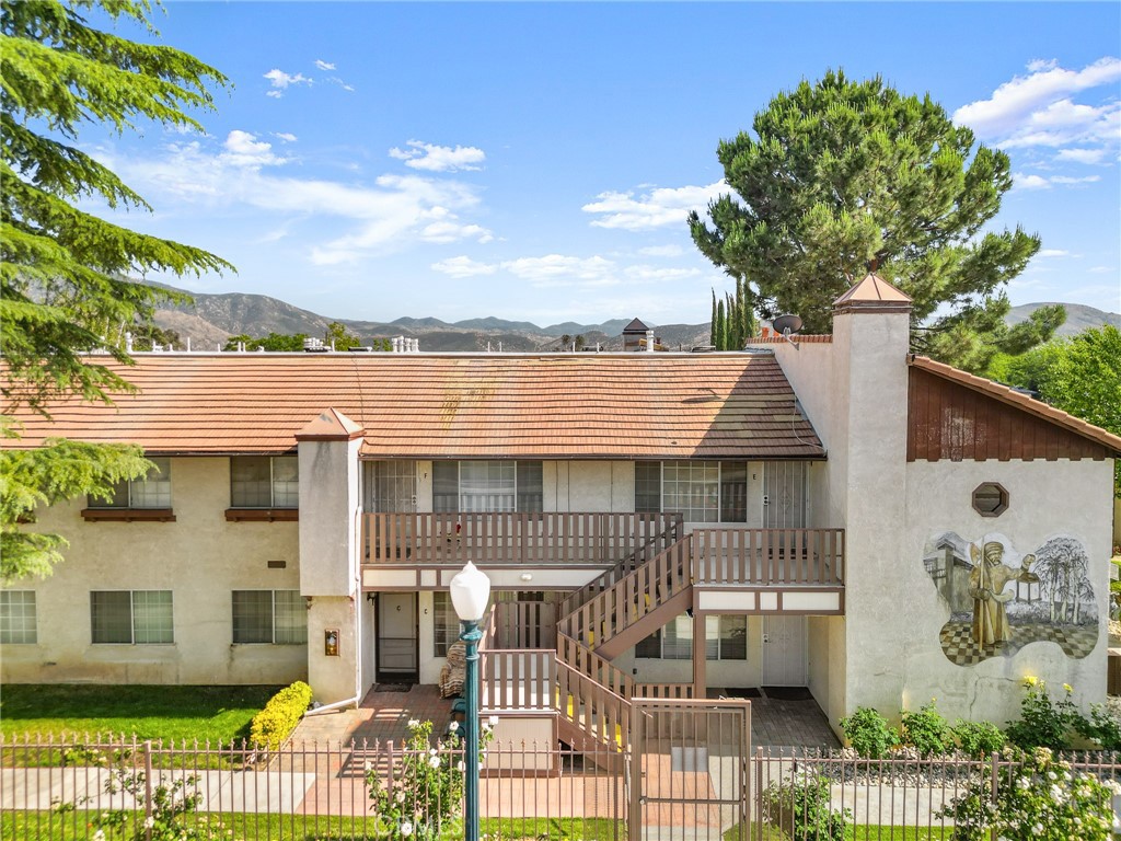 Discover comfort, convenience, and community in this charming condominium nestled in a serene 55+ gated enclave in the heart of Banning. Designed for easy living, this corner bottom unit is beautifully maintained and offers a relaxed lifestyle with on site amenities. Step inside to a bright and spacious living area, where large windows fill the space with natural light. The open-concept layout seamlessly connects the living room, dining area, and kitchen—ideal for entertaining or enjoying quiet evenings at home. This home features two well-sized bedrooms, each offering generous closet space and peaceful views of the surrounding greenery. Both bathrooms are clean and functional, serving both comfort and accessibility. Enjoy your morning coffee or an evening glass of wine on the private patio, surrounded by a serene, landscaped setting. On warm days, take a refreshing dip in the community’s sparkling pool—a true oasis just steps from your door. Additional features include: A detached 2 car garage for ample parking and storage, community laundry facilities for added convenience, close proximity to I-10, making travel and errands effortless. Whether you're relaxing poolside, connecting with friendly neighbors, or exploring nearby shops and restaurants, this condo offers the perfect blend of tranquility and accessibility. Experience the best of low-maintenance, resort-style living in this welcoming 55+ community.