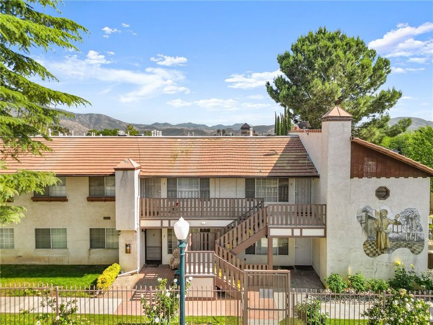 Discover comfort, convenience, and community in this charming condominium nestled in a serene 55+ gated enclave in the heart of Banning. Designed for easy living, this corner bottom unit is beautifully maintained and offers a relaxed lifestyle with on site amenities. Step inside to a bright and spacious living area, where large windows fill the space with natural light. The open-concept layout seamlessly connects the living room, dining area, and kitchen—ideal for entertaining or enjoying quiet evenings at home. This home features two well-sized bedrooms, each offering generous closet space and peaceful views of the surrounding greenery. Both bathrooms are clean and functional, serving both comfort and accessibility. Enjoy your morning coffee or an evening glass of wine on the private patio, surrounded by a serene, landscaped setting. On warm days, take a refreshing dip in the community’s sparkling pool—a true oasis just steps from your door. Additional features include: A detached 2 car garage for ample parking and storage, community laundry facilities for added convenience, close proximity to I-10, making travel and errands effortless. Whether you're relaxing poolside, connecting with friendly neighbors, or exploring nearby shops and restaurants, this condo offers the perfect blend of tranquility and accessibility. Experience the best of low-maintenance, resort-style living in this welcoming 55+ community.