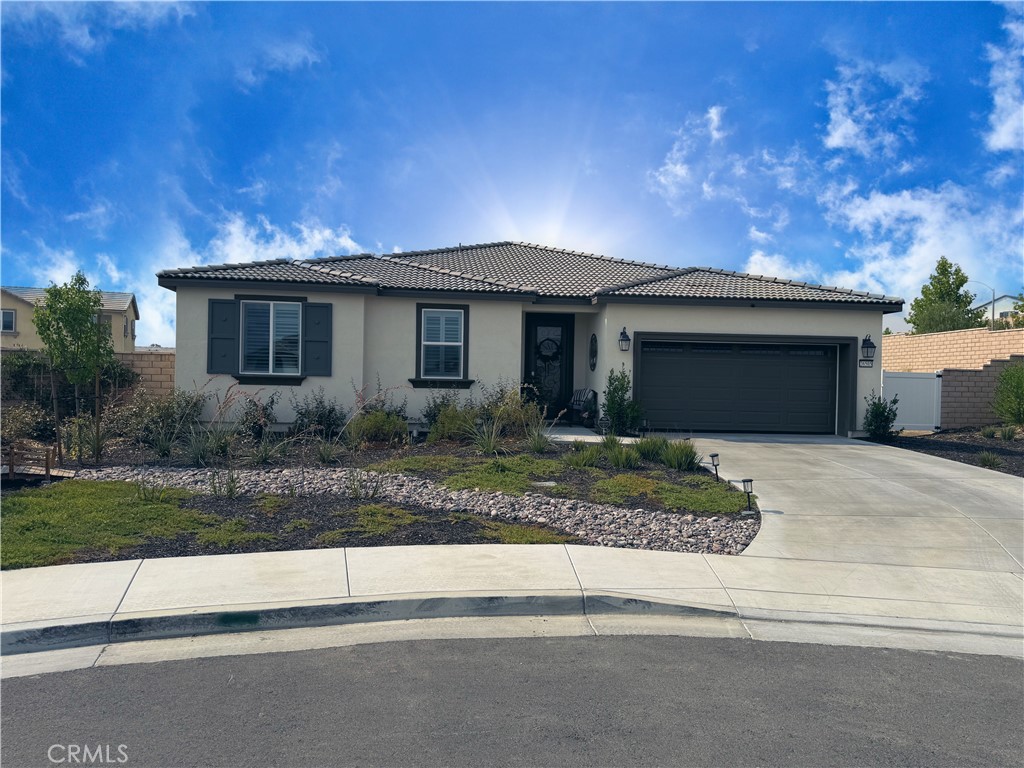 Welcome home! Come inside to experience everything you ever needed in this quaint single story home! This home is nestled on a cul-de-sac close to newer shopping centers including major retail stores. Near 215/15 freeways, this home boasts a large lot and a backyard that is clean and ready to make your own. One side of the backyard will be home to your RV, 5th wheel, or Class A complete with 50amp added to the property for your convenience. The other side of the yard is big enough to put in the pool of your dreams, if you so desire. This home checks all the boxes such as a the tile entry foyer which is wide and includes double door closet for storage or coats. This leads you to walk into the large open floor plan flaunting a large kitchen with grey cabinets and plenty of space for storage. The pantry has a custom glass and wrought iron door that matches the homes front door, just recently done. And the holiday cookies come easy with quartz countertops, double oven for baking, and room to enjoy sitting around the large island! The home has a well thought out floorplan with 3 bedroom plus 1 den that can be used as a room if needed with its double doors for privacy. Primary bedroom is large in size with attached full tub and shower, with an oversized walk in closet. The other two bedrooms share a nice sized full bathroom with double sink set up. The 3-car tandem garage is equipped with professionally installed ceiling storage racks that are yours to keep. This home is a must see! Too much to list, schedule a showing today!
