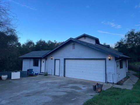 Photo of 13720 Misty Oak Rd Rd, Valley Center, CA 92082 (MLS # 260003718SD)