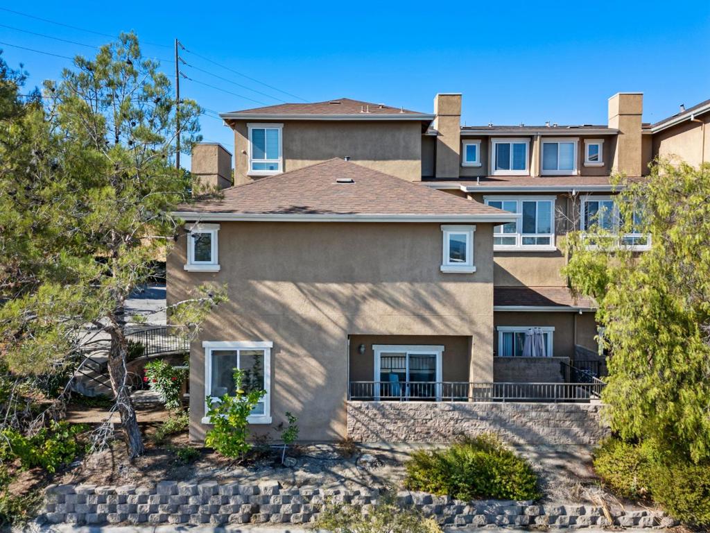 Beautifully updated 2-bedroom, 2.5-bath corner unit in the highly desirable Lancaster Gate community. Nestled in a quiet cul-de-sac, this home offers privacy, comfort, and style with stunning views of the Santa Cruz Mountains. Enjoy the convenience of an oversized driveway, side-by-side 2-car garage, and a spacious patio perfect for outdoor entertaining. Inside, approximately $65K in recent upgrades showcase modern finishes throughout, including a fully remodeled kitchen with quartz countertops, full quartz backsplash, refreshed cabinetry, new sink and fixtures, and all-new appliances (oven, cooktop, and dishwasher). All bathrooms have been thoughtfully renovated with new vanities, toilets, fixtures, and designer tile, featuring a step-in shower in the primary suite and a new soaking tub in the guest bath. Additional highlights include fresh interior paint, a water descaler, forced air heating and cooling, and a Nest thermostat. With low HOA dues of just $325/month, youll enjoy exterior maintenance, parking enforcement, landscaping, and access to the community pool. This move-in ready home perfectly blends comfort and style in one of San Joses most sought-after neighborhoods. This is a Perfect home for first time home buyers!