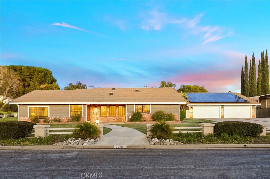Welcome to this stunning and meticulously upgraded 3,007 sq. ft. custom estate located adjacent to the picturesque orange groves of East Hemet. Nestled on a spacious .46-acre corner lot, this property features four bedrooms, three bathrooms, and a thoughtfully designed ADU—perfect for multi-generational living. Step inside to be greeted by vaulted, beamed ceilings in the living room, creating an inviting and airy ambiance. The heart of the home is the chef’s gourmet kitchen designed for culinary enthusiast, featuring a seamless single-slab granite countertop, a large island with ample storage, custom soft-close cabinetry, a stylish rock backsplash, a pot filler, and premium stainless steel appliances, including a double oven range, two dishwashers, and a trash compactor. A turntable organizer maximizes storage efficiency, while under-cabinet lighting and upper glass cabinets with interior lighting add a touch of elegance. All bedrooms are generously sized, with ceiling fans, walk-in closets, and the capacity to comfortably accommodate king-size beds. The primary suite is a true retreat, boasting crown molding and a spa-like en-suite bath with dual vanities and an oversized shower featuring dual shower heads. Throughout the home, you’ll find a mix of plush carpet and 20” diagonally laid tile flooring, offering both comfort and style.This home is wired for modern convenience, with an intercom system that extends to the exterior ADU, ethernet wiring throughout, and a whole-house attic fan. Energy-efficient upgrades include a tankless water heater, a reverse osmosis system, and fully paid solar system.
The ADU is approx. 800 sq. ft. and fully equipped with a kitchenette, bar area, oven, dishwasher, sink, full bathroom, bedroom, and a cozy living space—ideal for guests or extended family. The property’s exterior is equally impressive, featuring a four-car garage with epoxy flooring, built-in cabinetry, a workbench, dog washing station and Wi-Fi-enabled doors. A covered RV parking area includes remote gate access, 220V power, and full sewer and water hookups. Outdoor living is an entertainer's dream with a covered patio, a gas fire pit, and a sparkling salt water pool and Jacuzzi with app-controlled operation and newer equipment. Exterior landscape lighting enhances the ambiance, while the permanent holiday lighting package adds charm year-round. With modern upgrades completed recently, including updated plumbing, electrical, this home is truly move-in ready.