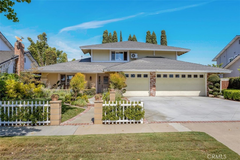 Welcome to this stunning two-story Mid-Century Ranch-style residence, ideally situated in a highly sought-after neighborhood within a top-rated school district. With inviting curb appeal, a spacious three-car garage, and a thoughtfully designed layout, this 5-bedroom, 3.5-bath home offers the perfect balance of comfort and sophistication.
Step inside to a welcoming foyer that opens to a bright and airy living room, complete with a beautiful fireplace, custom built-in display cabinetry, and a large picture window that floods the space with natural light. The main level features a primary suite with direct backyard access through expansive sliding glass doors, while upstairs includes an additional en-suite bedroom along with generously sized rooms ideal for family, guests, or a home office. The bathrooms have been tastefully updated with dual sinks, modern tile shower stalls, and a relaxing whirlpool bathtub. A separate laundry room adds convenience and functionality. The gourmet kitchen showcases granite counters, stainless steel appliances, and ample cabinetry, seamlessly flowing into the dining area with sliding glass doors that open to the backyard.
Step outside to private retreat where a beautifully landscaped backyard provides tranquility and space for gatherings. Mature fruit trees, lush plantings, and vibrant gardens surround multiple outdoor living areas, including a built-in BBQ, shaded patio, and cabana-style seating - perfect for entertaining or unwinding in total privacy.
This exceptional property blends timeless Mid-Century charm with modern upgrades, offering an inviting retreat both inside and out - waiting for you to call it home.