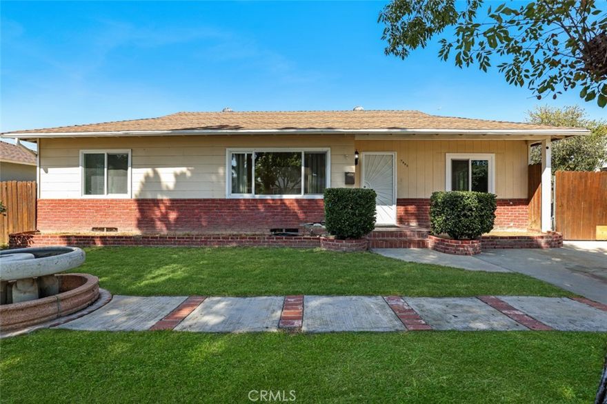 Welcome home to this charming single story home nestled away on a peaceful tree-lined street in the heart of Riverside.  Enjoy the updated kitchen along with recent remodels of two spacious & clean full baths offering comfort and style.  This home offers a bright open layout with a generous 8000+ square foot lot.  The primary bedroom features it's own full bath with super convenient adjacent laundry area.  The large backyard is open to your imagination with ADU potential.  Conveniently located near shopping, dining, parks, and schools.