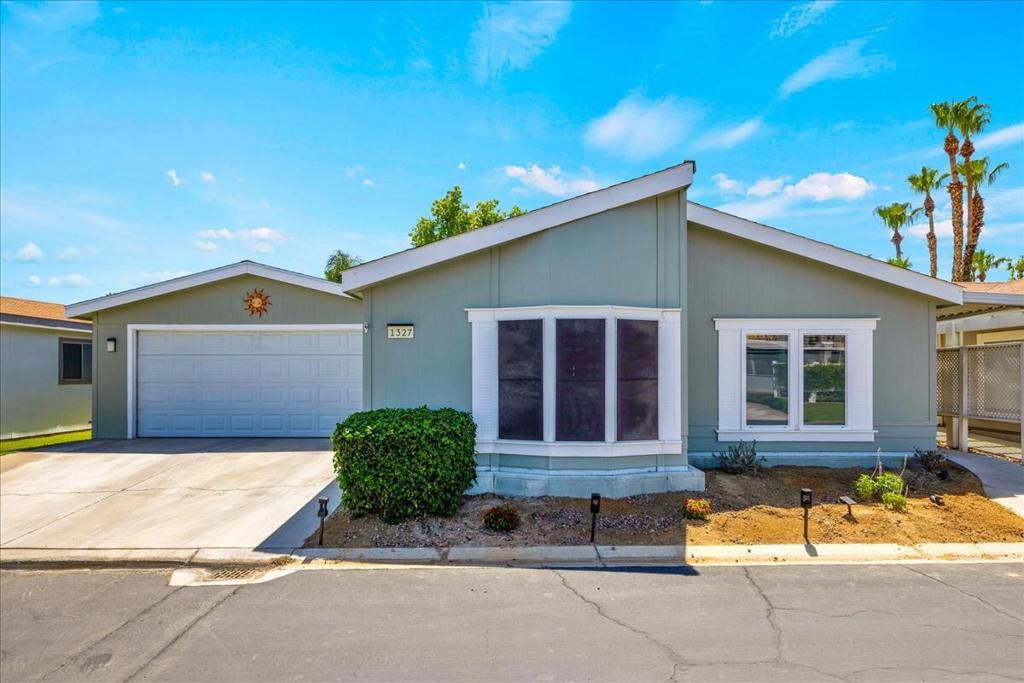 This beautifully updated home offers a spacious cook's kitchen with two islands and newer appliances (Sept 2023), perfect for entertaining. Featuring 3 bedrooms (one currently used as a media room), 2 bathrooms, a generous walk-in closet in the spacious primary suite, and a separate laundry room. Enjoy mountain views from the dining area and kitchen, relax on the covered private patio, and appreciate extras like a water softener, new roof (Duration Cool Shingle Roof System) installed Nov 2024and a two-car garage with direct access to the home. Located in a quiet, newer section of Desert Sands, a 55+ community which offers resort-style living with a clubhouse, fitness center, pool, spa, and tennis courts. One pet under 21 pounds allowed. Buyers must be park approved and show monthly income of at least twice the monthly space rent of $825. Furnishings may be available outside escrow per sellers inventory.