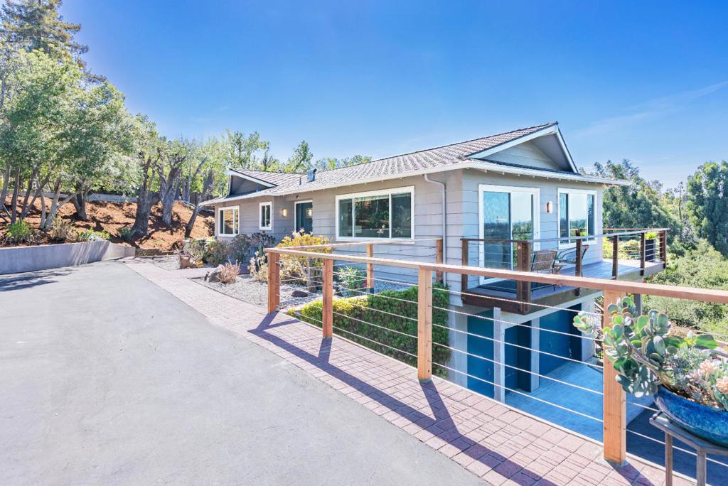 Recently remodeled Two-story retreat with jaw dropping views of the Bay Area and western mountains! Perched in a serene neighborhood just 1.5 miles from downtown Los Altos, this beautifully crafted home blends refined style with everyday comfort. Enjoy proximity to Top-Rated schools, Los Altos Golf & Country Club and premier tech hubs including Apple, Google and LinkedIn. Step inside to European Oak hardwood floors, led lighitng and large dual-pane windows that fill the home with natural light and frame stunning views, also visible from multiple decks/balconies. Heat/AC and a separate family room with cozy fireplace ensure year-round comfort. The kitchen features high-end stainless-steel appliances, granite countertops, vast cabinetry and a scenic dining area. All bedrooms are spacious with ample closet space, while the primary bedroom includes a large walk-in closet and updated en-suite bathrooms. Additional highlights include a two-car garage with EV charging and laundry room with washer, dryer and sink. Outside, the beautifully landscaped backyard offers a private setting for entertaining or relaxing. Conveniently located with easy access to Highways 85, 280, Foothill Expressway and Caltrain. Don't miss your chance to own one of Los Altos's finest homes. IT WILL GO FAST!