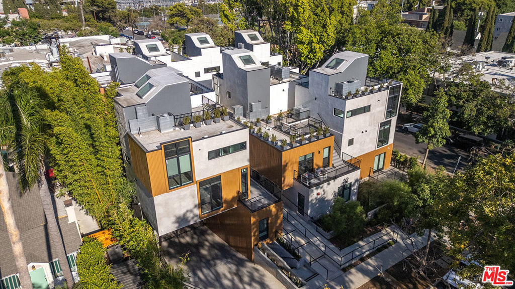 Enjoy a great lifestyle in this brand newly built stunning multi-level 3Bed. + Den/Office Townhome with its own cozy & private roof-top-deck located in highly desirable West Hollywood location. This spacious and sleek Residence offers a modern living-dining room featuring open designer kitchen with custom built cabinetry, quartz counter-top stones, top-of-the line appliances and terrazzo floors. The sumptuous primary bedroom Suite has generous closet space and luxury bathrooms with superb finishes. In addition to other two bedrooms, there is a multi-purpose bonus room ideal for office/ den, a powder room, an amazing private roof-top-deck and large balcony complimenting this superb property along with a recreational room/ gym, a subterranean gated parking area & separate storage space for each Residence. Exceptional and exclusive property perfect for indoor-outdoor California living! Prime location within close proximity to all stylish shops, restaurants and galleries.
