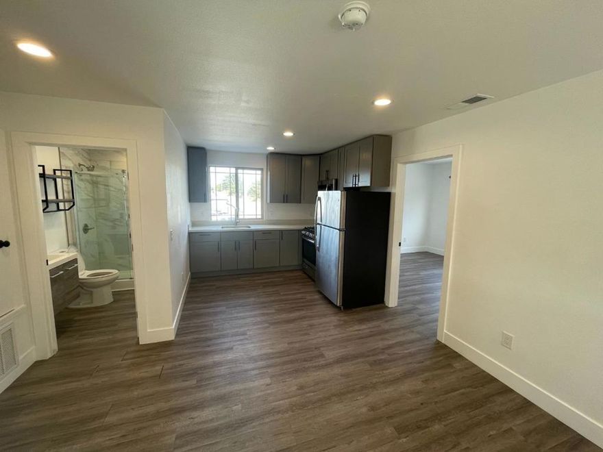 Step into this beautifully remodeled 3-bedroom, 1-bath apartment that blends stylish updates with comfortable living. Located in a quiet, well-maintained building, this bright and spacious unit features brand-new flooring, fresh paint, and contemporary finishes throughout.  The dining area offers plenty of natural light and is perfect for both relaxing and entertaining. The updated kitchen boasts sleek countertops, stainless steel appliances, custom cabinetry ready for all your culinary adventures.  Each of the three bedrooms is generously sized with ample closet space, while the newly renovated bathroom showcases elegant tilework, a modern vanity, and upgraded fixtures.  Conveniently located near local shops, restaurants, and public transit, this apartment offers the perfect combination of comfort, style, and convenience.