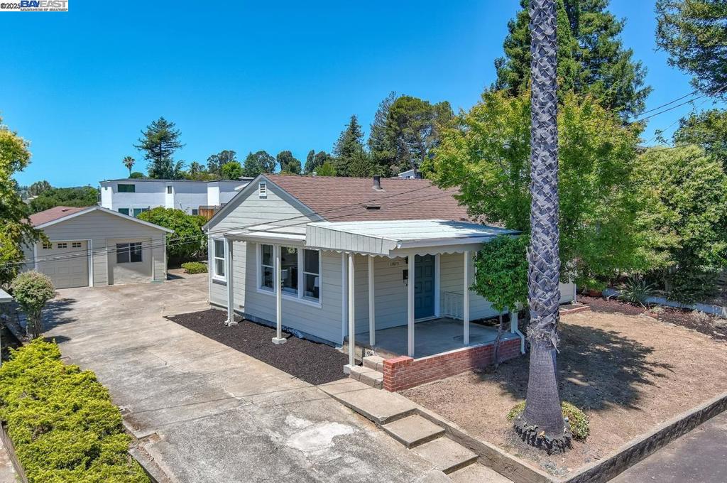 Welcome to 17673 Dorson Lane,a beautifully remodeled single-story home tucked in the heart of Castro Valley. From the moment you arrive, you’ll feel the care and attention that’s gone into every corner of this light-filled home offering 3 bedrooms, 1 bathroom, and 1,234 square feet of thoughtfully designed living space. Fresh paint, brand-new flooring, and updated lighting throughout give the home a bright, clean feel, while timeless finishes create a sense of calm and cohesion. The kitchen is a true standout—completely remodeled with quartz countertops, white shaker cabinetry with sleek new hardware, and a stylish new sink. The bathroom has been just as beautifully reimagined with a brand-new tub, vanity, flooring, and lighting—simple, beautiful, and totally move-in ready. But what truly sets this home apart is the detached bonus space tucked quietly behind the main home. With its own private entrance, it’s the kind of flex space that works for your life—whether you need a quiet place to work from home, a guest retreat, creative studio, or even potential rental income down the line. The backyard offers space to relax, garden, or entertain, and the location is ideal—close to local shops, Castro Valley schools, parks, and commuter routes.