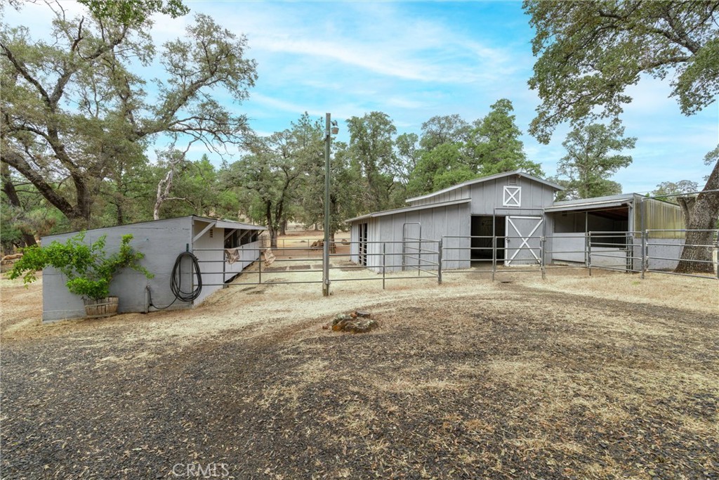 Historic Horse Property with Valley Views – 4.2 Acres, 3-Bedroom Home + ADU!
Welcome to a rare blend of history, comfort, and equestrian living. Situated on 4.2 scenic acres, this 3-bedroom, 2-bathroom home offers 2,018 sq ft of thoughtfully designed living space and is located on the former site of the historic Yankee Hill Hotel, originally built in 1853.
Inside, you’ll find both a living room and a family room—perfect for entertaining or relaxing—as well as a large walk-in pantry, utility room, and spacious deck overlooking breathtaking valley views. A 480 sq ft Accessory Dwelling Unit (ADU) offers additional space for guests, extended family, or rental income.
The Equestrian & Outdoor Features include a 6-stall barn with individual turnouts, goat pen, round pen and riding arena, ample pasture space, RV hookups with 50-amp service and septic clean-out, workshops, hay storage, and more.
Located just 8.5 miles to Lake Oroville Marina for boating, fishing, and recreation, approximately 30 minutes to Chico, Paradise, or Oroville, a quiet, private setting with panoramic views with unlimited recreation opportunities.
Whether you're looking for a serene homestead, a horse-ready retreat, or a property steeped in local history, this unique offering has it all. Come experience the beauty and potential of this remarkable property for yourself.