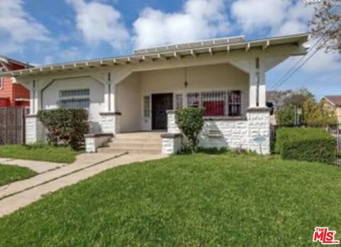 Photo of 4153 Brighton Ave, Los Angeles, CA 90062 (MLS # 26641609)