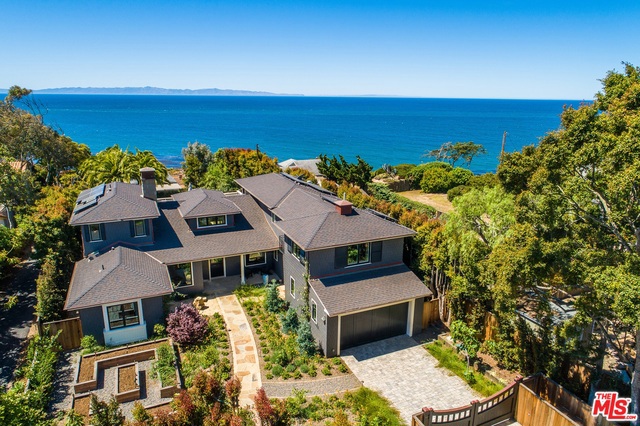 Welcome to your Ocean View Dream Coastal Oasis, where the ocean meets sophistication in one of Santa Barbara's most sought-after walking neighborhoods. This Newly Built, Gated Beach Area Estate has been created with remarkable attention to detail and impeccable craftsmanship, ensuring an unparalleled living experience for ocean lovers, beachgoers, and families alike. Step into this Stunning 5-bedroom, 4-bathroom Hampton's Contemporary single-family residence and be captivated by its Spectacular Interior, High Ceilings, and refined styling. The Magnificent Great Room boasts an open concept with clean lines, offering the perfect setting for gatherings and entertaining. Stroll to the Beach relishing in the warm sunsets and the enchanting ambiance of this exceptional property. Natural light pours in through disappearing nano glass doors highlighting the Breathtaking Ocean Vistas & Lush Gardens as well as the architectural design, gorgeous hardwood floors and stone fireplace, inviting you to flow to the Spacious Dining Terraces and Indoor and Outdoor Living Rooms. In moments you can unwind in the Luxurious Jetted Spa, on Garden Patios, or Cozy Cushioned Porch Swings. Indulge in the breathtaking Ocean Views from Two Primary Bedroom Suites, both featuring Ensuite Baths and glorious ocean view terraces. The Gourmet Kitchen is an epicurean delight, complete with Custom Cabinetry, Stone Island, Top-of-the-line Appliances, Dual Ovens, Dual Dishwashers, Butler's Pantry, Bar Area and Designer Lighting. Seamlessly transition to the Large Family Room with Cathedral Ceilings, or enjoy indoor/outdoor dining with an Outside Kitchen, BBQ, refrigerator, Pizza Oven, and Hot Outdoor Shower. See Sailboats and watch for Dolphins & Whales, as well as relax on your soft lawn with Organic Gardens, Berries and Fruit Trees. Environmentally conscious features such as solar panels and a Tesla charger, combined with a State-of-the-Art Security System, provide modern convenience and peace of mind. This incredible estate has a Fully Fenced Yard and welcomes Pets, ensuring that every member of your family can bask in its exquisite beauty. Don't miss this rare opportunity to experience the quintessential Santa Barbara lifestyle, where timeless elegance meets seaside serenity. Designer furnishings and Every Amenity. Inquire for more details and your dates.