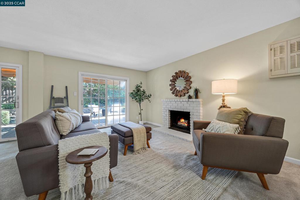 Welcome to this beautifully maintained 3-bedroom, 2-bath mid-century gem located in the heart of Martinez. Nestled on a quiet street just minutes from freeway access, shopping, dining, and top-rated schools, this home offers the perfect balance of comfort, style, and convenience. Step inside to discover an inviting open floor plan filled with natural light, featuring original hardwood floors, vaulted ceilings. The spacious living room flows seamlessly into the dining area and updated kitchen—perfect for entertaining or everyday living. Each bedroom offers generous space and storage, while both bathrooms blend classic charm with thoughtful updates. The primary suite includes a private bath and views of the landscaped backyard. Outside, enjoy a large, fenced yard with mature trees, ideal for relaxing, gardening, or weekend gatherings. With nearby trails and parks just around the corner, outdoor adventures are always within easy reach. Don’t miss this rare opportunity to own a piece of mid-century history in one of Martinez’s most convenient and desirable locations!
