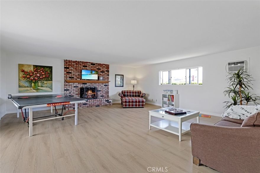 Single story and spacious, and uncrowded on a large corner lot, this updated and expanded home in coveted Eastgate is one you can enjoy for the rest of your life!  In the past five years, only six homes within the Bell Intermediate School boundary (a perfect 10/10 on GreatSchools!) have been offered with over 2,500 sq. ft. on a single level — and this home delivers nearly 2,800! Sitting proudly on a large interior corner lot among well-kept, pride-of-ownership homes, this lovingly maintained, thoughtfully customized and expanded residence offers a scale and versatility rarely found in the neighborhood. 



The curb appeal is delightful with espresso-colored 2-car garage, oversized driveway with bonus off-street parking, and a bountiful lawn and flora including specimen-quality juniper. The courtyard entry leads to a spacious living room with fireplace, open to a generous kitchen with center island and abundant cabinetry. Spaces filled with natural light highlight new paint and modern wide-plank flooring for a fresh, elegant atmosphere. A formal dining room flows into a massive rear family room with a second fireplace all its own — a haven of relaxing privacy, ideal for entertaining as well. Four well-proportioned bedrooms and two baths include a primary suite with newly remodeled direct-access bath. And   an inside laundry room is a luxury everyone can appreciate!



Out back, a beautiful new patio cover shelters a just-right outdoor space, a canvas for endless possibilities. What’s your vision? Hardscape and firepit? Citrus trees and raised herb garden? A hammock and book nook? And on top of all this awesome, this sanctuary is walkable to top-rated elementary, middle, and high schools, less than ½ mile to Chapman Sports Park, and just over 10 minutes to Long Beach Airport or Huntington Harbor for kayaking, beach days, or Bolsa Chica Wetlands hikes. 



This rare combination of size, thoughtful layout, and prime location in one of West Garden Grove’s most sought-after neighborhoods makes 12202 Wutzke Street a must-see.