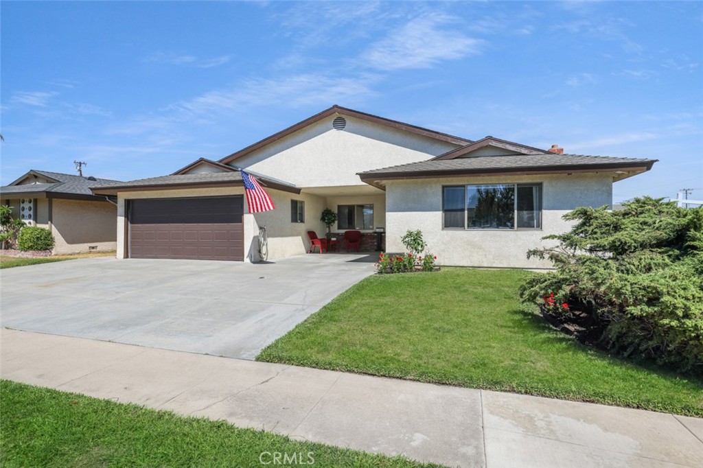 The Unicorn of Unicorns in Eastgate! In the past five years, only six homes within the Bell Intermediate School boundary (a perfect 10/10 on GreatSchools!) have been offered with over 2,500 sq. ft. on a single level — and this home delivers nearly 2,800! Sitting proudly on a large interior corner lot among well-kept, pride-of-ownership homes, this lovingly maintained, thoughtfully customized and expanded residence offers a scale and versatility rarely found in the neighborhood.
The curb appeal is delightful with espresso-colored 2-car garage, oversized driveway with bonus off-street parking, and a bountiful lawn and flora including specimen-quality juniper. The courtyard entry leads to a spacious living room with fireplace, open to a generous kitchen with center island and abundant cabinetry. Spaces filled with natural light highlight new paint and modern wide-plank flooring for a fresh, elegant atmosphere. A formal dining room flows into a massive rear family room with a second fireplace all its own — a haven of relaxing privacy, ideal for entertaining as well. Four well-proportioned bedrooms and two baths include a primary suite with newly remodeled direct-access bath. And an inside laundry room is a luxury everyone can appreciate!
Out back, a beautiful new patio cover shelters a just-right outdoor space, a canvas for endless possibilities. What’s your vision? Hardscape and firepit? Citrus trees and raised herb garden? A hammock and book nook? And on top of all this awesome, this sanctuary is walkable to top-rated elementary, middle, and high schools, less than ½ mile to Chapman Sports Park, and just over 10 minutes to Long Beach Airport or Huntington Harbor for kayaking, beach days, or Bolsa Chica Wetlands hikes.
This rare combination of size, thoughtful layout, and prime location in one of West Garden Grove’s most sought-after neighborhoods makes 12202 Wutzke Street a must-see.