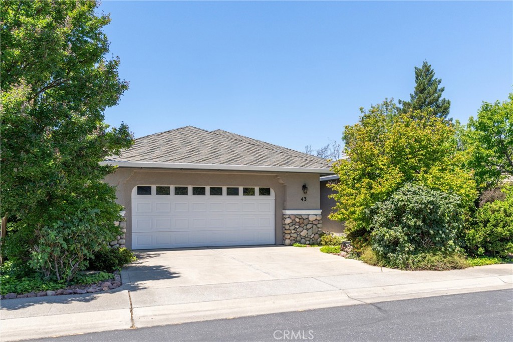 A very rare opportunity to live on the lake in Sierra Sunrise Village, a 55 and older community with OWNED SOLAR. This house has a large open floor plan with a lot of natural light. The living room has a gas fireplace with a built-in bookshelf and cabinetry. Large glass sliders that lead directly to the gorgeous inground gunite pool and lake. The beautiful open kitchen has granite counters, light oak cabinets, an eating bar, and a desk area. Master bedroom has 2 spacious walk-in closets and a glass silding door to have direct access to the pool and lake. Master bathroom includes a walk in shower and a large jacuzzi tub that stays hot for 30 minutes. Other amenities include surround sound, recessed lighting, ceiling fans throughout, skylights, whole house fan, and a large indoor laundry area. Neighborhood offers parks, walking trails, and security patrol. Updates included newer gutter guards, newer oven, newer refrigerator, newer dishwasher, newer microwave, and a newer hot water heater. Bathrooms have new tiled floors, sinks, toilets, and granite counter tops. Both the interior and exterior have been professionally painted. Low HOA fees. This house won't last long on the market! It's like living in your own personal Oasis! Schedule your tour today!