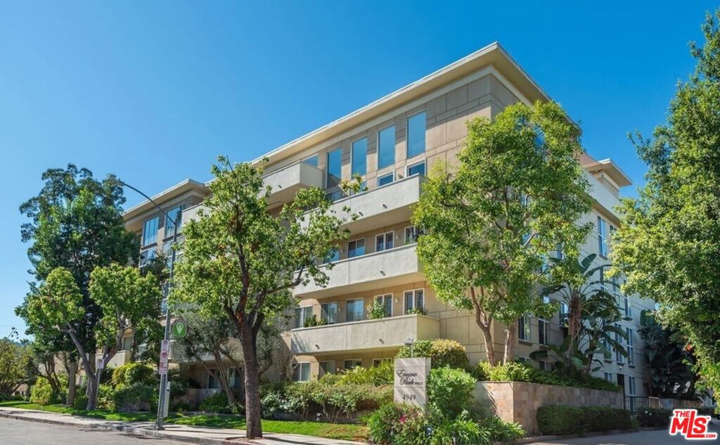 Welcome to Encino Park West, a luxury full service building in the heart of Encino. This ground floor, one level; two-bedroom, two bath unit with expansive patio area is a rare treasure. The lush ivy lined and full green space patio runs the entire length of the unit, giving plenty of room to take in the fresh air of the outdoors or let the kids play. A very well maintained elegant unit, with a seamless layout and great privacy. The primary bedroom suite is very large allowing space for a king bed and a seating area. Finishing off the primary suite with a walk in closet including luxury built-in's make for a well organized space; a double vanity bathroom with walk in shower and separate massive tub make for a spa like experience. The second bedroom has built in cabinetry, a great office or flex space. A well equipped functional kitchen with wood cabinetry, double wall oven and built-in breakfast nook. Additional features include a formal dining area, built in tv console, hardwood floors, side-by-side in unit laundry, high end shutters on all windows, and two tandem parking spaces. Building amenities include 24-hour security and concierge located in the grand lobby, a pool/spa, sauna, a recreation room with full kitchen and library, a gym, and secure mail room. HOA fees cover cable, gas, sewer, trash, water, building insurance, elevator maintenance, and groundskeeping, ensuring a seamless and worry-free living experience. Across the street from beautiful Encino park, an easy stroll to world-class shopping and top rated schools. Encino Park West is a luxury residence that evokes ease of living with the presence of a great community.