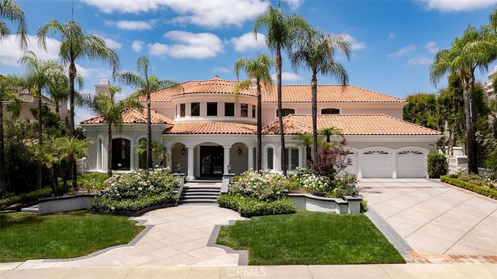 Rare opportunity to own a stunning 8,000+ sq ft luxury smart home located in the highly coveted guard-gated community of Mountain View Estates in Calabasas. This fully upgraded residence features a grand entry with soaring ceilings, leading to a remodeled gourmet kitchen with Sub-Zero, Wolf & Miele appliances, custom cabinetry & walk-in pantry. Control4 home automation, LED lighting, Cat 6 wiring & whole-house sound system throughout. Expansive family room with fireplace, custom bar, built-in projector, and dual wine coolers—ideal for entertaining and movie nights. Oversized dining room seats 30+ comfortably. Luxurious master suite offers a sitting area, fireplace, dual walk-in closets & spa-style bath with steam shower. Resort-style backyard features a saltwater pool, outdoor kitchen (BBQ, fridge, stove, warming drawer), multiple covered seating areas & outdoor projector. Additional highlights include a soundproof podcast studio & 100+ bottle temp-controlled wine room. A true entertainer’s dream in one of Calabasas’ most prestigious communities!