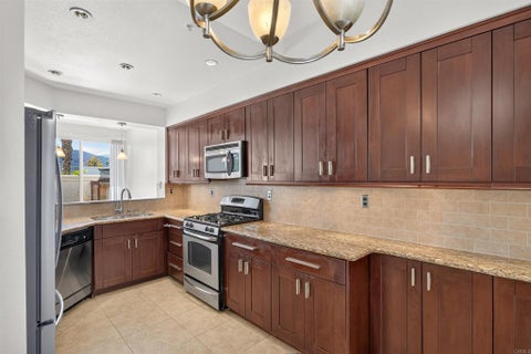 Photo of 11356 Via Rancho San Diego #E, El Cajon, CA 92019 (MLS # PTP2607869)