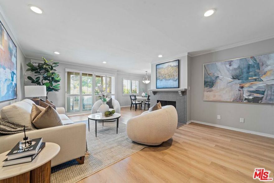 Beautifully Remodeled Top-Floor Corner Unit with Treetop Views in Prime Westwood. Welcome to this sun-drenched, top-floor corner condo offering exceptional privacy with only one shared wall and serene rear-facing treetop views. Thoughtfully and tastefully updated, this 2-bedroom, 2-bathroom home features a remodeled kitchen that seamlessly opens to a dining area and a spacious living room perfect for relaxing or entertaining. The primary suite is a true retreat with two oversized closets featuring custom built-ins, and a full-size washer and dryer conveniently located inside the unit. The private balcony offers a peaceful setting to unwind and enjoy the view. Located in a well-maintained, secured courtyard building with a sparkling pool, this home sits in the highly sought-after Westwood Charter School district. Just moments from UCLA, the metro, shopping, and dining, this inviting residence combines comfort, style, and a truly unbeatable location. A rare gem that checks all the boxes .