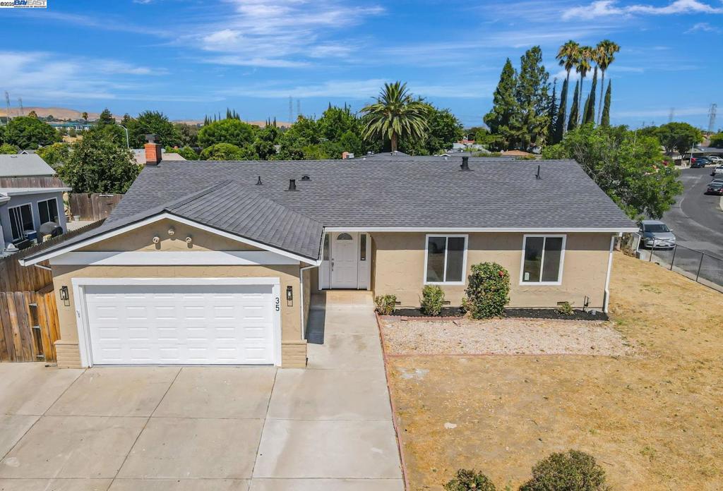 East-facing, large corner lot conveniently located near restaurants and Los Medanos Elementary! This home offers a spacious primary bedroom, two guest rooms, two bathrooms and 1,420 sq. ft. of living space on a 7,650 sq. ft. lot. It features a spacious, light-filled living room and a separate family room with a cozy fireplace and a glass sliding door to the backyard, enhancing the home with natural light. Modern updates throughout include new flooring and fresh interior paint. The upgraded kitchen features stainless steel appliances and both bathrooms have been tastefully renovated. Step outside to a spacious backyard with extra space ideal for RV or boat parking. Additional features include a brand new roof, new windows and doors, new light fixtures, central heating and AC, upgraded landscaping and more! Come check it out!