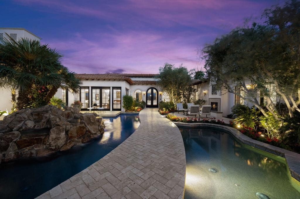 Enter thru the gated private courtyard with fireplace and ponds to this exquisite estate built by Dave Jacobsen / Monarch Homes. This newly renovated home is located on a quiet section of coveted Ross Avenue in the exclusive Madison Club and features stunning new fixtures and features. Fabulous oversized great room with fireplace combines with the stunning chef's kitchen fit for a world class chef with butler's prep room, counter and breakfast room seating, stunning formal dining room with courtyard views and wine room for 550+ bottles. Comfortable media room with seating for 9, card table, dry bar/snack center is perfect for everyday family entertainment. Distinguished private study/library with impressive wood finishes and French doors opening to the yard. Oversized master suite with sitting area, dual master his and hers dressing closets as well as 2 additional guest suites and separate casita guest house off the courtyard. Sparkling pool, entertainment loggia with fireplace overlooks panoramic mountain and Tom Fazzio golf course views between the 2nd and 3rd fairways with beautiful south exposure.
