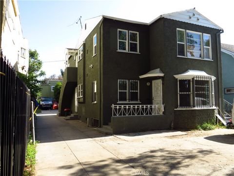 Photo of 862 W 41st Street, Los Angeles, CA 90037 (MLS # CV26114082)