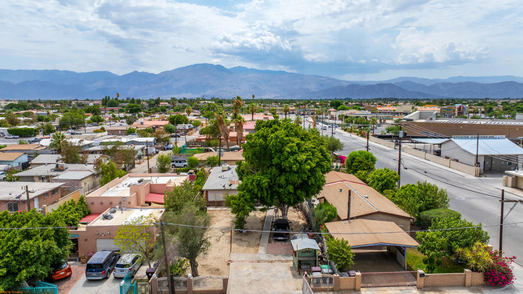 Don't miss this incredible opportunity to own a well-located duplex with their own meters gas and electricity in the heart of rapidly expanding Downtown Coachella. This versatile property features two separate units: one offering 3 bedrooms and 1 bathroom, and the other with 2 bedrooms and 1 bathroom--perfect for investors or owner-occupants looking to offset their mortgage with rental income.One unit is currently tenant-occupied with a lease in place through December. Situated within walking distance to grocery stores, a new gas station, and upcoming developments, this location offers both convenience and promising future growth. Whether you're looking to generate steady rental income or live in one unit while renting the other, this duplex delivers flexibility and long-term value. Schedule your private showing today and take advantage of this income-producing gem in one of the desert's fastest-growing communities