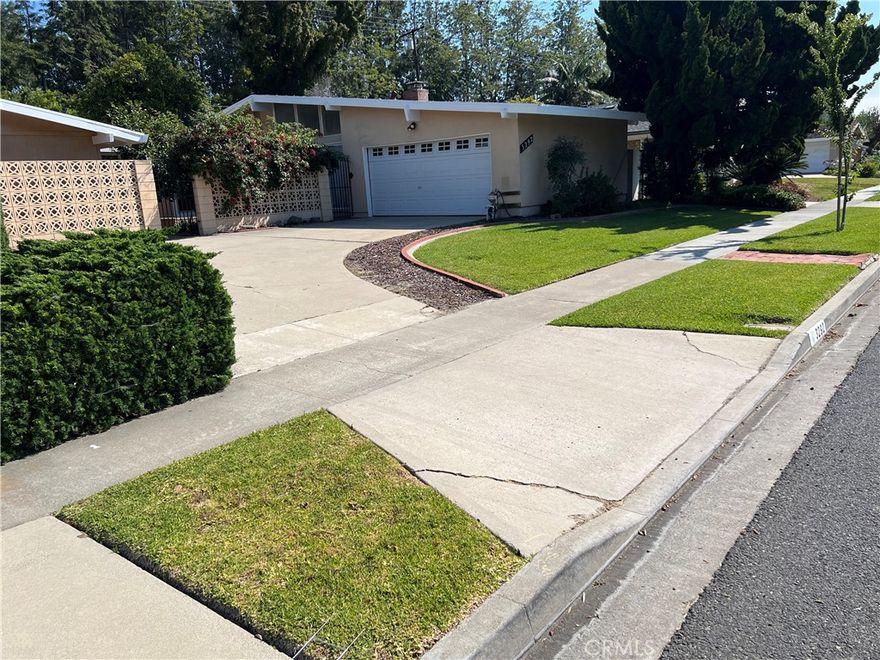 This lovely, ranch-style, single-story home boasts updated bathrooms and kitchen, high ceilings, and an open floor plan. The large backyard is a peaceful oasis with matured fruit trees and 2 covered patios, perfect for entertaining. The home is located in a convenient location near highly-rated schools, major freeways, and shopping centers.