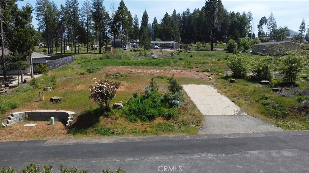 Fantastic, affordable lot in Magalia that is ready to build! The lot has been cleared off but still has an existing driveway that could be used for future plans. The previous home was 3 bedrooms, 2 bathrooms, 1,451 sqft. This location is close to Holiday Market and other shopping. Septic condition is unknown.