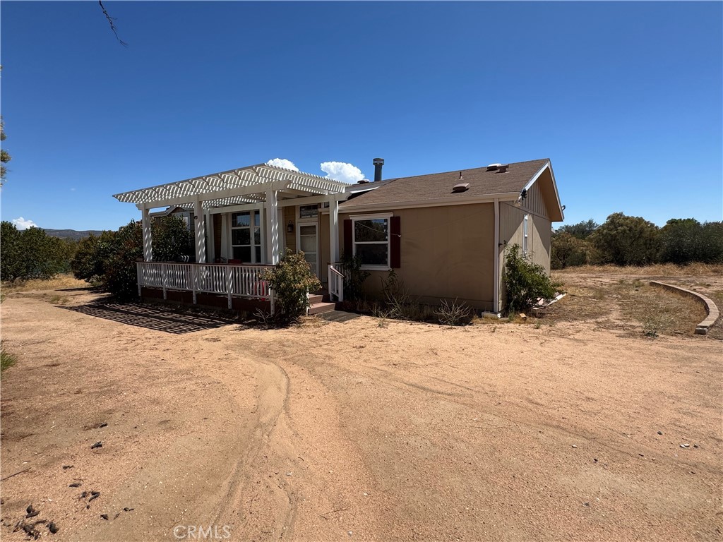 Turn-Key Anza Home with Expansive Workshop on 2.53 Acres
Welcome to this amazing move-in ready 3-bedroom, 2-bathroom home with den, set on 2.53 acres of all-usable land. Offering 1,620 sq. ft. of living space, the split floor plan provides the perfect balance of privacy and function, with the primary suite on one side and guest bedrooms on the other. The home includes both a formal dining room and a bright eat-in kitchen.
Thoughtful upgrades throughout include new vinyl flooring, a remodeled kitchen with quartz countertops, tile backsplash, and stainless steel appliances, along with upgraded light fixtures, ceiling fans, and tinted windows.
Enjoy outdoor living with two covered porches plus an additional shaded area, ideal for relaxing or entertaining while taking in the fresh mountain air and scenic views.
Car enthusiasts, hobbyists, or business owners will love the 2,400 sq. ft. fully insulated steel workshop/garage featuring upgraded 220-amp electricity and oversized 14+ ft roll-up doors.
This property is the perfect blend of comfort, functionality, and country charm—come see it today and make Anza your home!