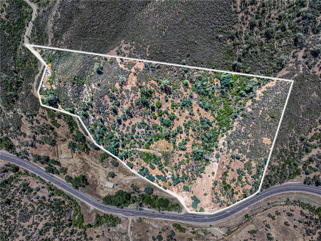 Discover the tranquility and potential of this beautiful 20-acre parcel located in scenic Lake County, California. This rural property offers a blend of usable land, natural features, and ready-to-build improvements—perfect for your dream homestead, hobby farm, or peaceful retreat. The land features gently rolling terrain with open clearing with many trees creating a picturesque landscape and offering privacy from neighbors. A prepared site pad with septic is already in place, ideal for building a home, cabin, or RV setup—saving you time and development costs. With plenty of sun exposure, the property is also a great candidate for solar power, off-grid living, or sustainable gardening. Whether you're looking to build now or invest in raw land for future development, this Lake County gem offers a solid foundation and stunning natural setting. This is a rare opportunity to own a manageable slice of Northern California's countryside with essential infrastructure already in place. Build your vision and enjoy life off the beaten path.