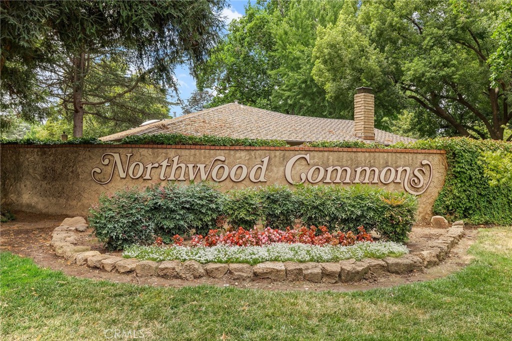 Live amongst the trees in beautiful Northwood Commons, Chico’s most desirable condominium communities. This home features a spacious living room with vaulted beam ceilings, cozy brick fireplace, sky lights and large windows that bring the outdoors in. This 2 bed 2 bath home boasts a living room and primary bedroom that are both generously sized, offering a comfortable and open feel. Enjoy resort style amenities including a pool, spa, clubhouse, tennis court, and bocce ball court, all covered by your HOA dues. The HOA also takes care of roof maintenance, yard landscaping, garbage, water, and shared septic, making for easy, simplified living.
