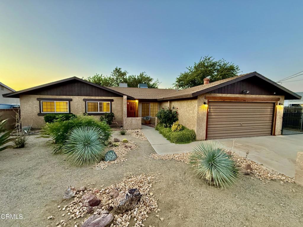 TWO HOMES ON ONE HUGE 1/2 ACRE LOT. A rare opportunity to buy a home with a detached ADU (Guest Quarters) that can pay you income monthly. This beautifully remodeled property is in the desirable Quartz Hill community west of Lancaster. The front house is a spacious, remodeled 3+2 single family property with about 1,748 square feet. The stand-alone two-story ADU at the rear of the property has also been remodeled and has about 753 square feet. It is a 1+1 with a, kitchen and bonus room that could be used as a 2nd bedroom or a home office. The living quarters is on top of a full sized two car garage. For real privacy, a private driveway goes directly from the street to the rear of the property and the ADU. Together the front and back homes offer about 2,501 square feet of space. This is a must-see to believe property.