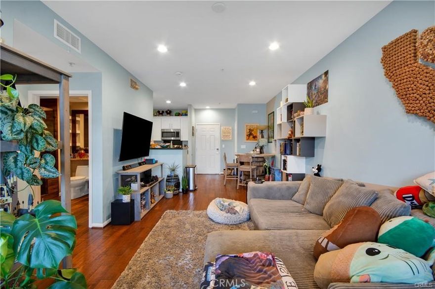 Top-floor 1 bedroom condo with 2 parking spaces. High ceilings with walk-in closet and upgraded kitchen with granite counters and stainless-steal appliances included.

Indoor laundry with washer & dryer included. Association amenities include heated pool and spa; sunning deck; dry sauna; conference room and business center; club/game room; fully equipped fitness center; and landscaped garden courtyards with fountains and barbecue areas. Desirable location in Anaheim's dynamic Platinum Triangle, close to Angel Stadium, The Gardenwalk, Honda Center, The Grove, the Amtrak station, OC Vibe, and of course the magic of Disneyland and Downtown Disney.