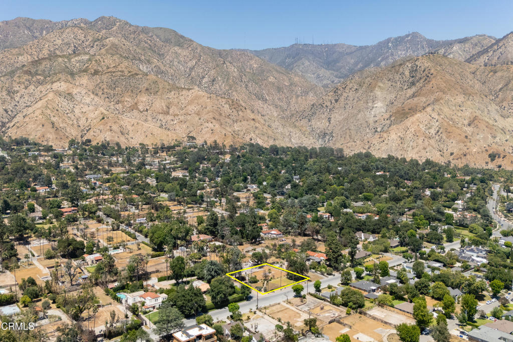This is an exceptional opportunity to own a prime property in one of Altadena's most desirable neighborhoods. Located in the sought after Altadena Country Club area, this generous lot spans over half an acre, approximately 22,050 square feet, offering ample space and endless potential. This setting provides the ideal canvas right in the heart of Altadena. The previous home offered approximately 3,900 square feet of living space. Public assessor records reflect 2,975 square feet. Buyers are encouraged to verify and explore all possibilities. Buyers are advised to independently verify all aspects of the property with the County of Los Angeles and appropriate government agencies, including, but not limited to, lot remediation, future use of the property, rebuilding and permitting requirements, zoning and lot size. Property is being sold in as-is condition without warranties or guarantees of future use. Both Phases I and II of the property cleanup and debris removal have been completed. Drive-by only, please do not walk on the property.