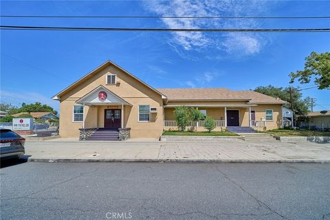 Photo of 600 S Towne Avenue, Pomona, CA 91766 (MLS # PW26090512)