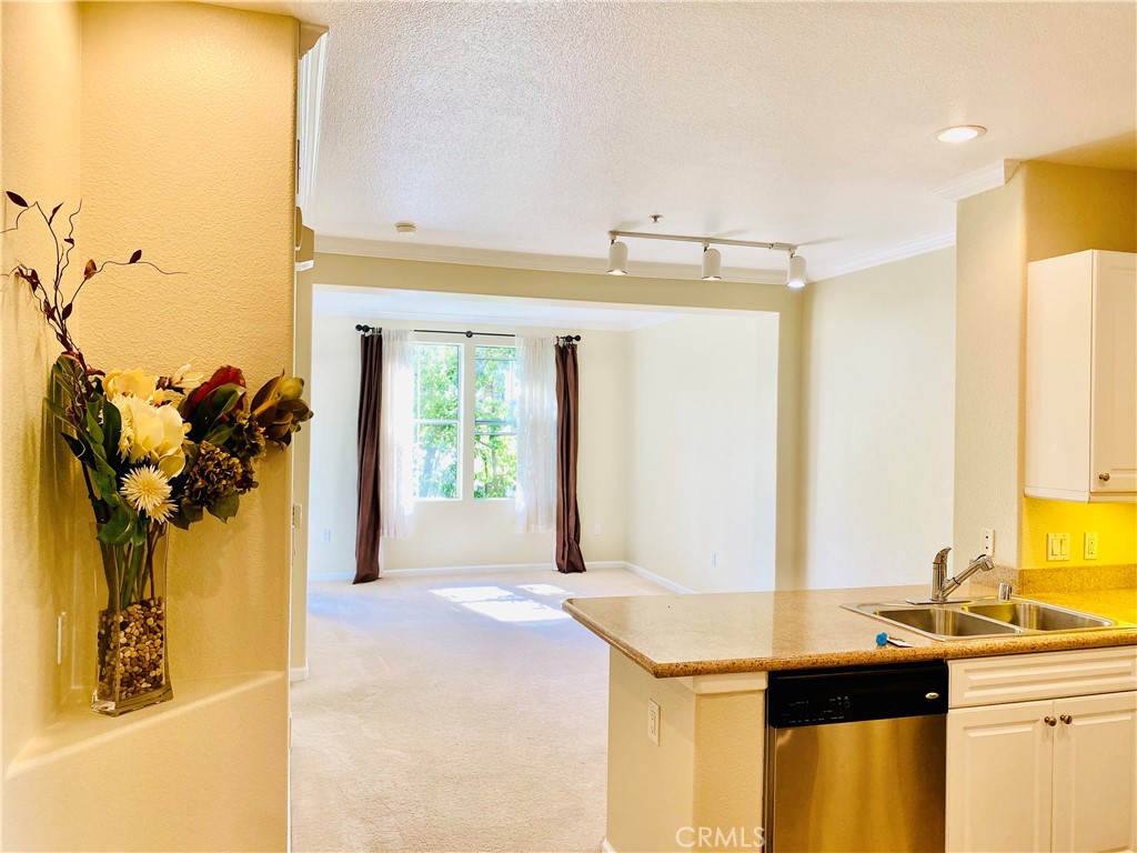 Rare End unit, Pool View, Beekman plan available now at the Watermarke Condominium Community!
Enjoy afternoon sun on the patio overlooking the pool while listening to the relaxing sounds of a bubbling waterfall.
It comes upgraded with custom paint, granite counter tops, crown molding, stainless steel appliances and includes refrigerator and washer/dryer. It features a large Jack-and-Jill bathroom with two entrances: one directly from the bedroom and another one from the entrance hallway, making it convenient for the owners yet private when you have visitors.
Watermarke's amenities include 3 pool areas heated year-round with 4 spas, 24 hour fitness center, covered sports court, tennis courts, and a clubhouse with on site concierge, business center, movie theater, game room and much more.
Come enjoy all that Watermarke has to offer!