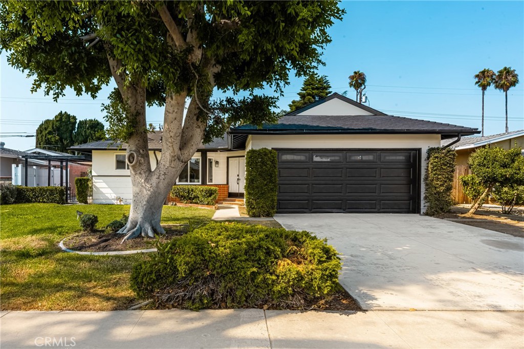 One-of-a-kind home available to own in the most peaceful neighborhoods in all of Garden Grove! This is an opportunity to own a gorgeous home in one of the most impressive hidden gem locations in the heart of Orange County! This home is a beautifully renovated 3 Bed, 2 Bath property, positioned just a stone's throw away from Disneyland, Angel Stadium, and the Convention Center. This home is perfect as a primary residence, and it is perfect as a long term investment. Every part of the home has been beautifully transformed! Upon pulling up to the home, the curb appeal creates pride of ownership that is rare - gorgeously placed landscaping & an ideal home placement within the neighborhood. The exterior of the home has been upgraded with premium paint & trim, beautiful double pane vinyl windows, and an upgraded roof. Once you enter the home through the front door, a beautiful & functional layout is immediately experienced, and vaulted ceilings in the family room give the home a brilliant unique quality that separates this home from others. The open floor plan is absolutely perfect for entertaining friends & family, and also provides the premier environment for personal enjoyment & relaxation. The floor has been upgraded with luxury vinyl plank, and is newly installed throughout the entirety of the home. The kitchen is completely renovated - with new cabinets, high end countertops, new dishwasher, new microwave, new stove, upgraded LED canned lighting, and remodeled tile backsplash. The home also has a very functional attached 2 car garage, providing a direct entrance from the garage to the home, and superior functionality. And the back yard is large in size - providing endless possibilities to improve a property that is already spectacular! Don't let this home slip away. Come take a look today!