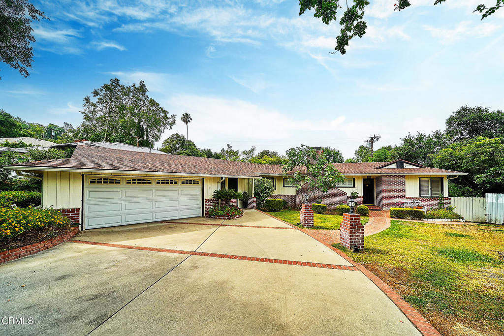 Nestled on a quiet cul-de-sac in the heart of La Canada Flintridge, this beautiful 3-bedroom, 2-bath home offers a seamless blend of comfort, style, and traditional charm. Thoughtfully remodeled over the past several years, it retains its classic character while incorporating modern conveniences throughout.Inside, you'll find a bright and airy interior filled with natural light and a smooth flow between living spaces. The inviting living room is perfect for both relaxing and entertaining, while the adjacent dining area opens to a cozy breakfast nook and an updated kitchen featuring timeless finishes, quality cabinetry, and appliances. Step outside to a private backyard retreat, complete with a heated pool and spa, a covered patio ideal for year-round enjoyment, and lush, mature landscaping. Additional highlights include a separate laundry room, central air and heat, and an attached garage.Ideally located just minutes from award-winning La Canada schools, parks, and local amenities, this home offers the perfect balance of function, comfort, and charm in one of the area's most sought-after neighborhoods.