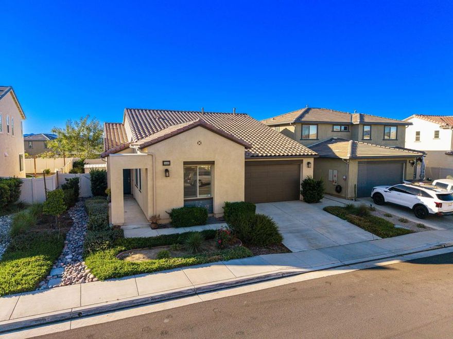 Welcome to 1445 Galaxy Drive -- where comfort, style, and community meet in the heart of Beaumont's desirable Sundance North neighborhood!This beautifully maintained single-story home offers an open floor plan with 3 spacious bedrooms plus an additional office/den, 2 bathrooms and a 2-car garage. From the moment you arrive, you'll notice the inviting curb appeal, manicured landscaping, and pride of ownership from the original owners. Inside, natural light fills the space, complemented by bright paint tones, crown molding, plantation shutters, tile flooring, and plush carpet throughout.The seamless flow between the kitchen, dining, and living areas makes it perfect for entertaining family and friends. The gourmet kitchen is the centerpiece of the home, featuring a large prep island, upgraded cabinetry, pantry, and modern appliances.Retreat to the primary suite, complete with a spacious walk-in closet, soaking tub, walk-in shower, dual sinks and a private bathroom. The additional bedrooms are generously sized, and the guest bath features a shower-tub combination. A separate indoor laundry room with built-in cabinets adds convenience.Step outside to your private backyard where you can enjoy a harvest of homegrown fruit trees including avocado, orange, tangerine, peach, and plum. Perfect for relaxing or entertaining under a covered concrete patio with an extended shaded pergola.Sundance North is one of Beaumont's most sought-after communities, featuring multiple parks, BBQ areas, and swimming pools for residents to enjoy -- all with a low HOA. Zoned for top-rated schools including Starlight Elementary, San Gorgonio Middle, and Beaumont High.With its prime location, scenic surroundings, and move-in-ready condition, this property is truly a gem to call your own. Don't miss this opportunity -- schedule your private tour today!