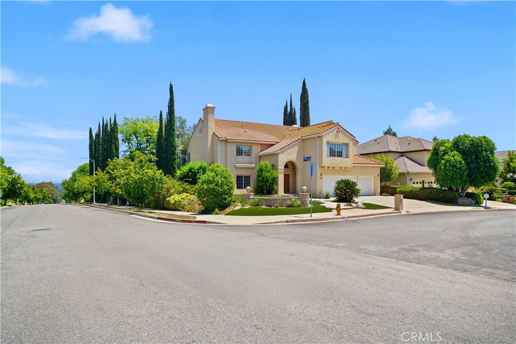 Live in style in the prestigious Stonegate community—known for award-winning schools and scenic surroundings! This 5-bedroom, 5 bathroom home features an open concept layout, spacious kitchen, downstairs guest suite, and a grand master with dual walk-in closets and a spa-style bath. Upstairs includes another suite plus two bedrooms with a Jack-and-Jill bath. Enjoy outdoor living with a BBQ and relax. You are minutes from Westfield Topanga, The Commons, Parks, and hiking trails. Tree car garage and elegant details throughout - this home has it all.